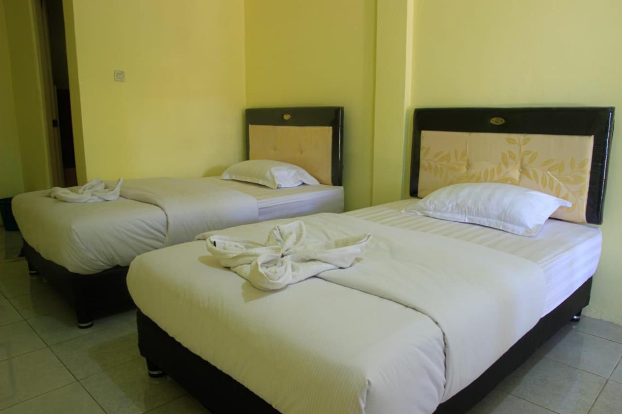 Pondok Wisata Dan Restoran Elim Ваингапу Экстерьер фото