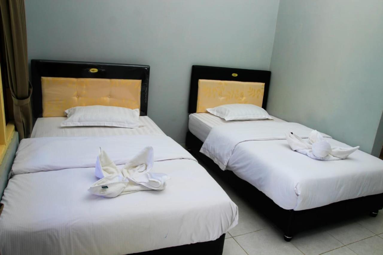 Pondok Wisata Dan Restoran Elim Ваингапу Экстерьер фото